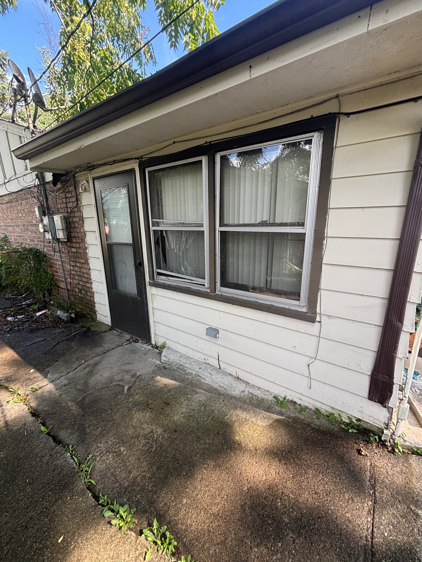 Lansing 3/1 Brick Home - Flip or Hold - Priced to Move!